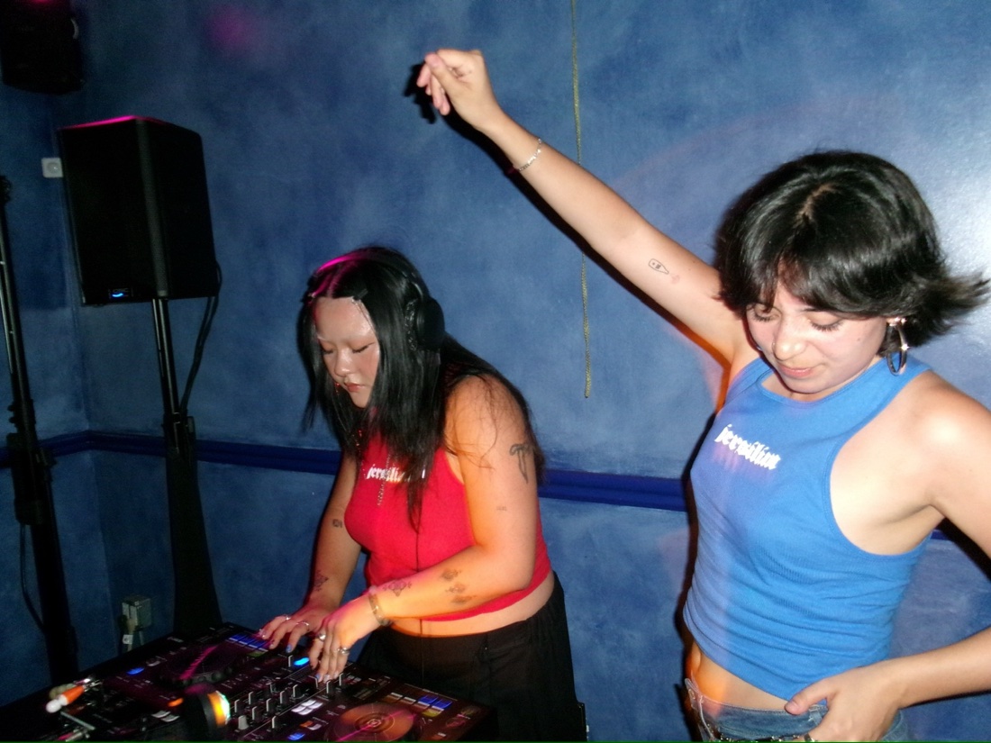 DJ and a dancer at Boyfriend Co-op